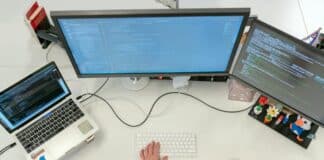 7 Mistakes to Avoid When Integrating Legacy Systems With Modern Platforms Software Engineer Coding on Computer